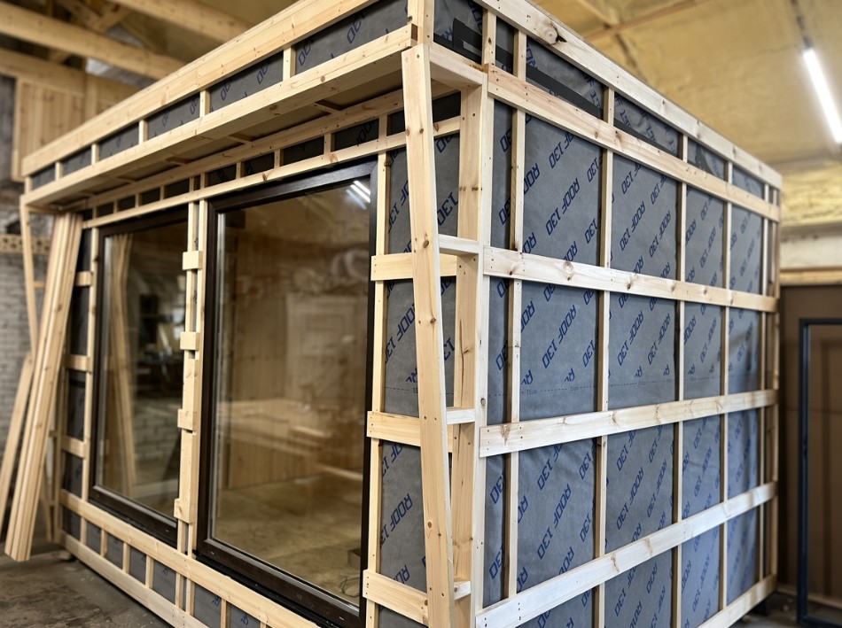 Sauna wall frame with insulation and vapour barrier, before the timber cladding goes on